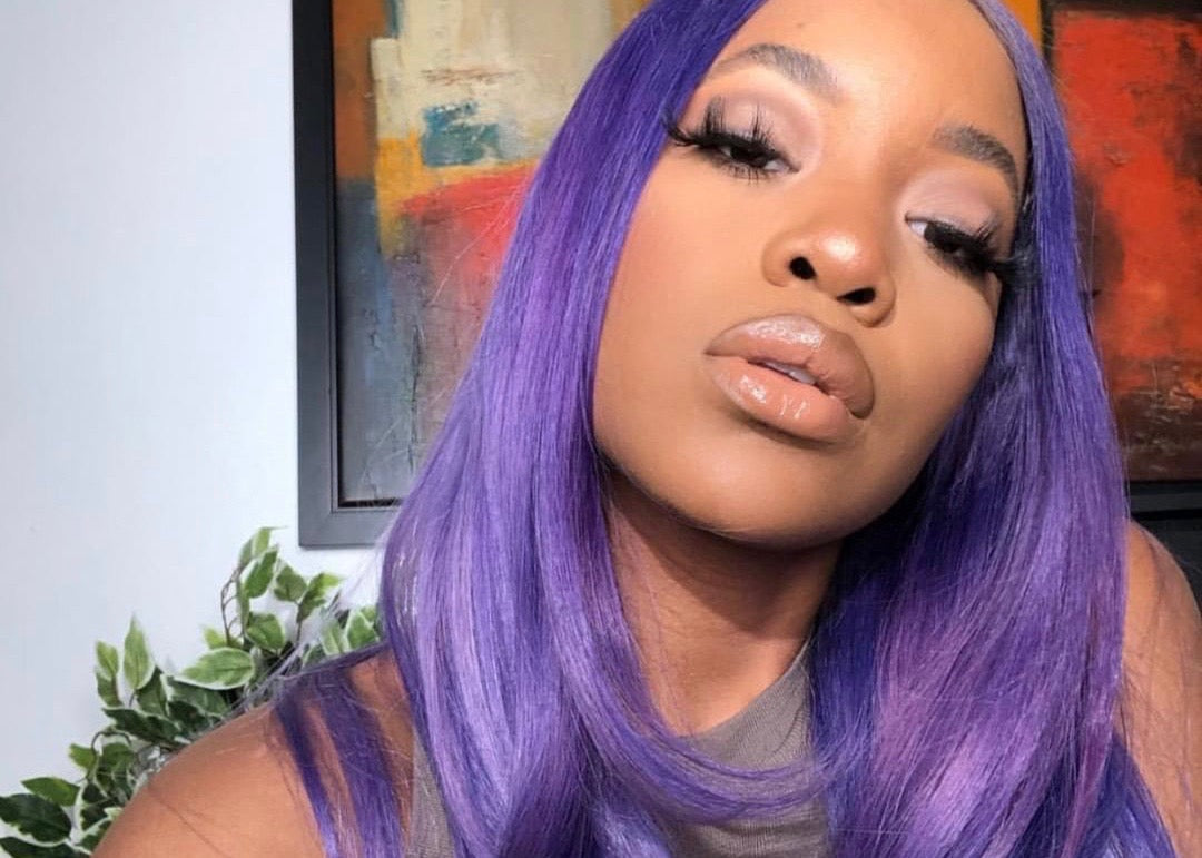 Mikai McDermott wearing a purple wig via Instagram